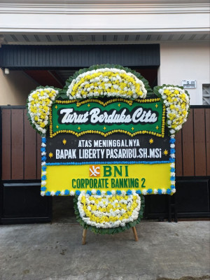 Papan Bunga Duka di Pardamean