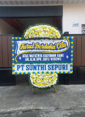 Papan Bunga Duka di Pardamean