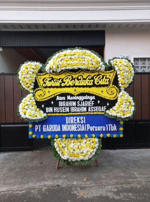 Papan Bunga Duka di Pardamean