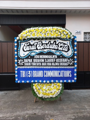 Papan Bunga Duka di Pardamean